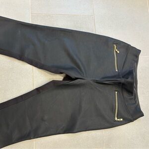 Faux leather front with gold zipper leggings